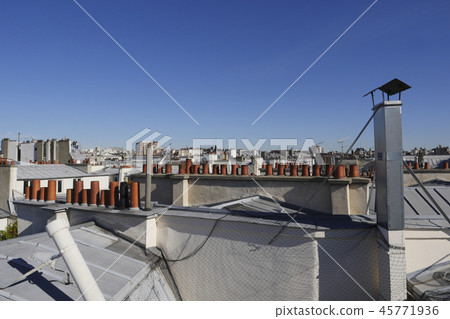 The roofs of Paris and its chimneys under a clouds sky The roofs of Paris and its chimneys under a clouds sky 45771936