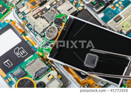 electronic chip in tweezers electronic chip in tweezers 45772938