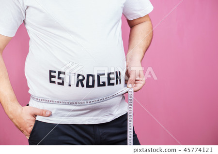estrogen level, overweight man with measuring tape estrogen level, overweight man with measuring tape 45774121