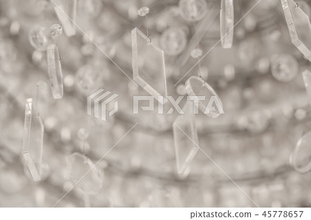 Blurred glass pendants background in brown colors Blurred glass pendants background in brown colors 45778657