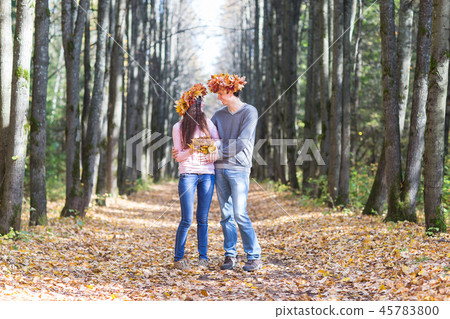 Young couple in autumn Park. 45783800