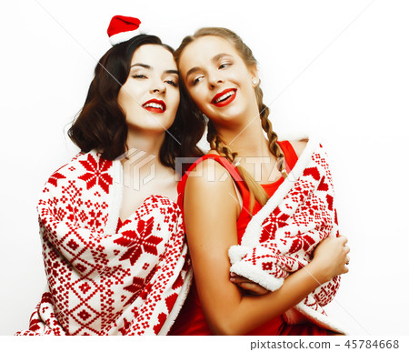 young pretty happy smiling blond and brunette woman girlfriends  45784668