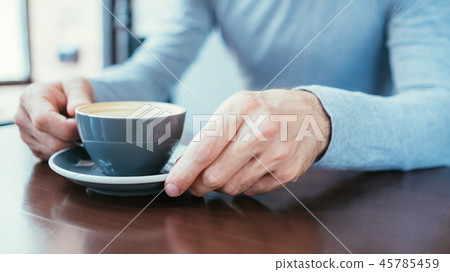 man hand hold mug coffee caffeine addiction habit man hand hold mug coffee caffeine addiction habit 45785459