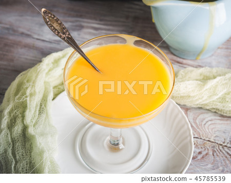 Lemon curd served in stemmed glass 45785539
