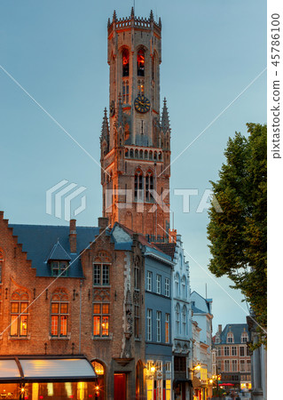 Brugge. The Tower Belfort on the sunset. 45786100