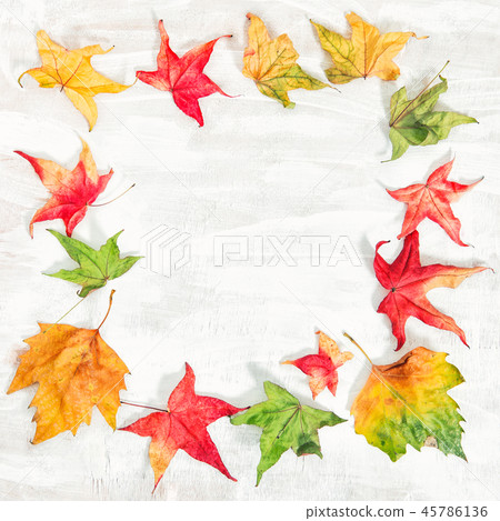 Autumn leaves on wooden background Autumn leaves on wooden background 45786136