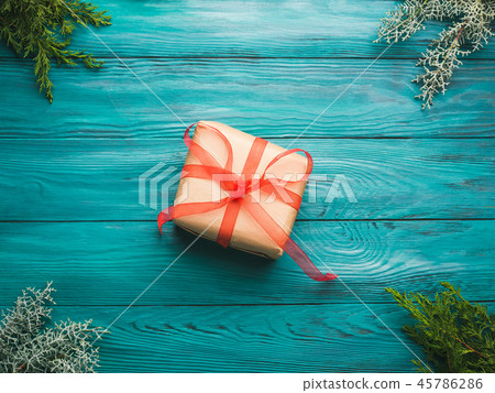 Christmas gift box on green background 45786286