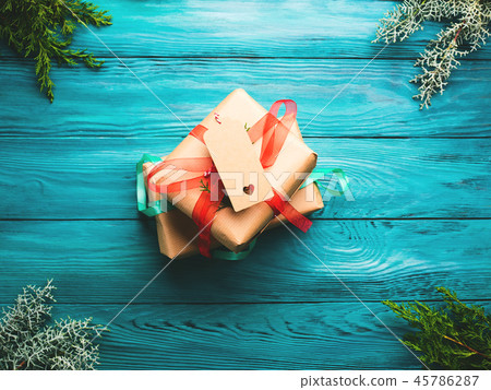 Christmas gift boxes on green background Christmas gift boxes on green background 45786287