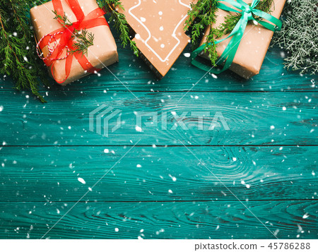 Christmas gift boxes on green background Christmas gift boxes on green background 45786288