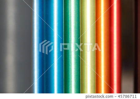 Pattern of different colored iron pipe. background 45786711