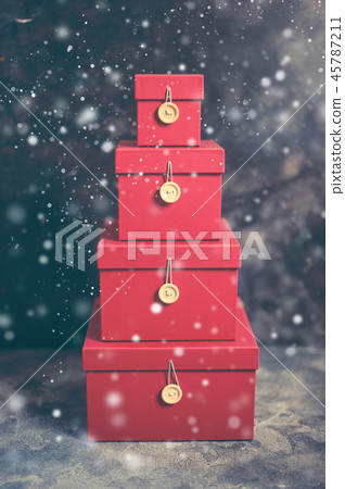 close up of a stack of storage boxes on dark background 45787211