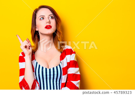Woman on yellow background Woman on yellow background 45789323
