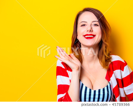 Woman on yellow background 45789366
