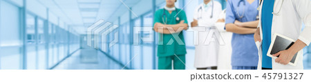 Doctor working in hospital with other doctors. 45791327