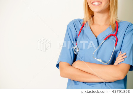Young woman doctor portrait on a white background. Young woman doctor portrait on a white background. 45791898