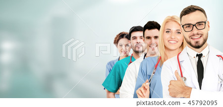 Doctor working in hospital with other doctors. Doctor working in hospital with other doctors. 45792095