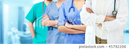 Doctor working in hospital with other doctors. 45792208