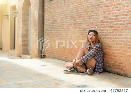 Depressed teenage woman feeling sad and lonely. Depressed teenage woman feeling sad and lonely. 45792257