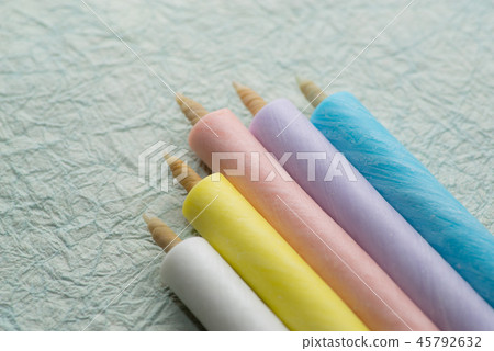 Japanese candles 5 colors Grass-colored Japanese paper background Japanese candles 5 colors Grass-colored Japanese paper background 45792632