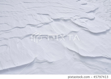 Winter's back sunlight pattern of snow surface 45797413