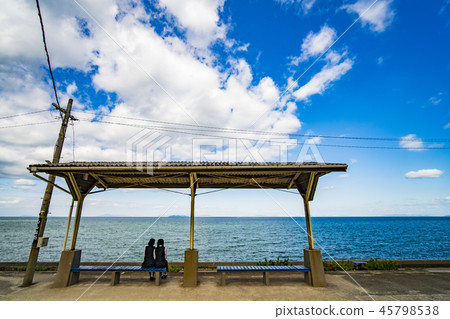 Look at the sea and wait for the train Look at the sea and wait for the train 45798538