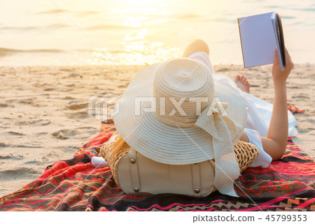 Beautiful women travel alone at the beach Summer 45799353