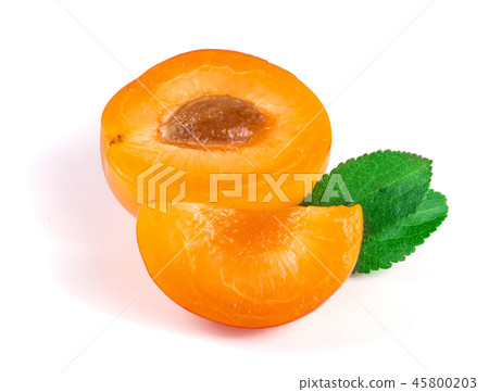 Yellow plum half and slice with leaves isolated on white background 45800203