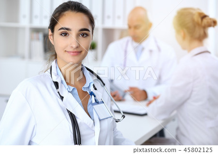 Portrait of young doctor woman  in hospital. Hispanic or latin american staff in medicine 45802125