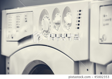 washing mashines closeup in appliance store 45802353
