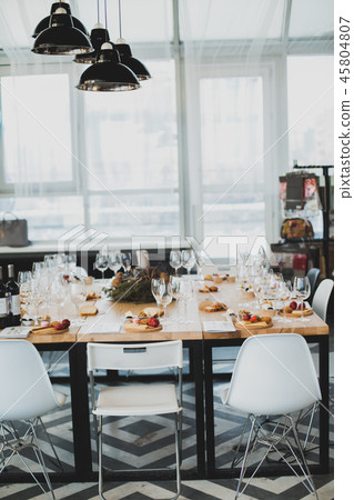 Table setting with wine and snacks, etiquette and event Table setting with wine and snacks, etiquette and event 45804807