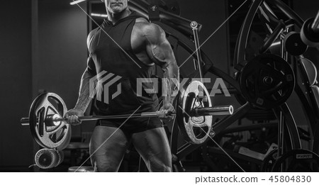 Handsome man with big muscles, posing at the camer 45804830