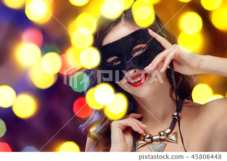 Beauty model woman wearing venetian masquerade carnival mask at party 45806448