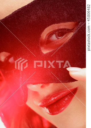 Beauty model woman wearing venetian masquerade carnival mask at party 45806482