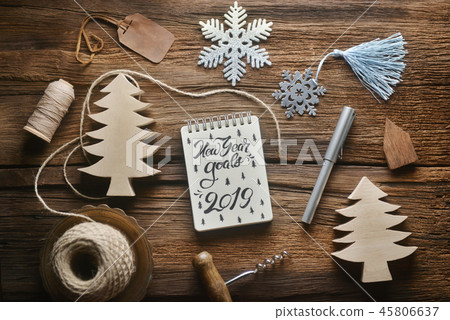 Sketchbook on wooden table in Christmas theme. Sketchbook on wooden table in Christmas theme. 45806637