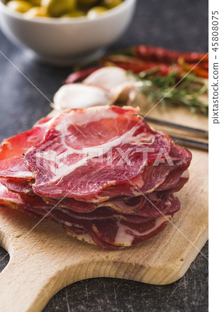 Dried pork meat slices. 45808075