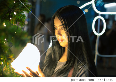Young Asia woman in celebration Christmas Holiday Young Asia woman in celebration Christmas Holiday 45812250