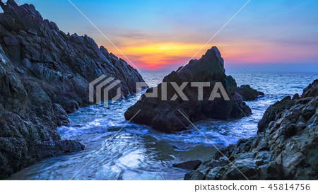 big one shaped rock in beautiful sunset 45814756