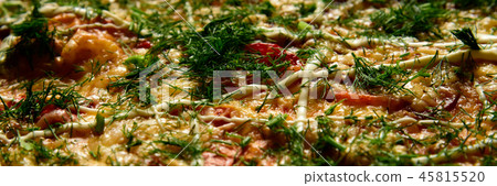 Pizza background - macro shot delicious italian pizza Pizza background - macro shot delicious italian pizza 45815520
