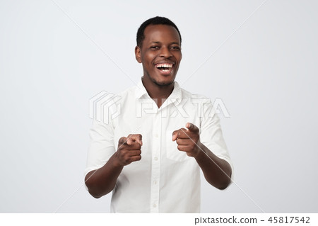 Smiling business man point you saying You are excellent. Smiling business man point you saying You are excellent. 45817542