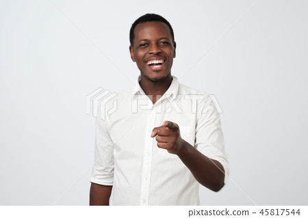 Smiling business man point you saying You are excellent. Smiling business man point you saying You are excellent. 45817544