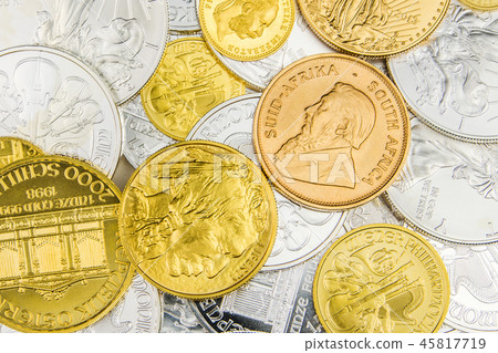 mixture of silver and golden coins 45817719