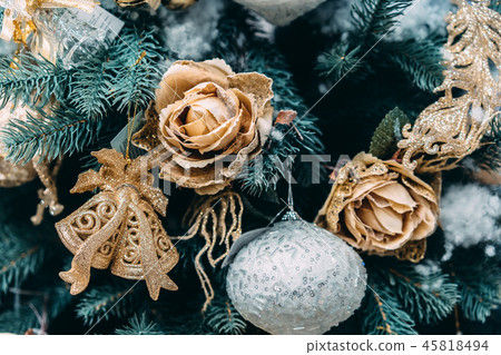 Christmas silver ball on branch at Christmas tree. 45818494