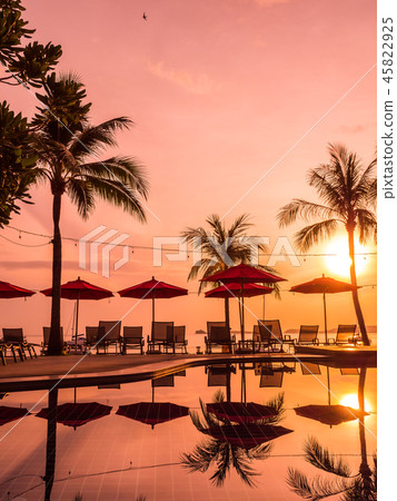 Umbrella and chair around outdoor swimming pool in hotel and resort Umbrella and chair around outdoor swimming pool in hotel and resort 45822925