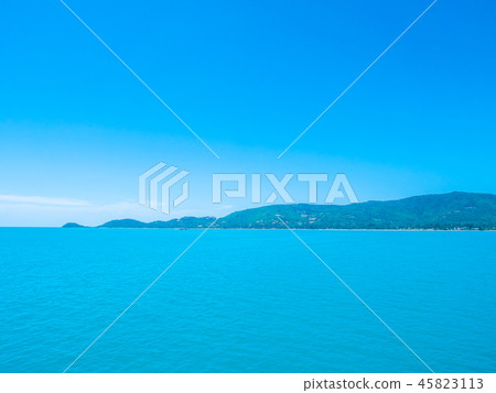 Beautiful tropical sea ocean with white cloud on blue sky background Beautiful tropical sea ocean with white cloud on blue sky background 45823113
