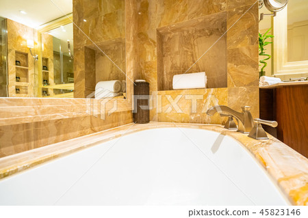 Beautiful luxury white bathtub decoration interior Beautiful luxury white bathtub decoration interior 45823146
