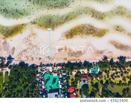 Aerial view of beautiful tropical beach and sea with trees on island Aerial view of beautiful tropical beach and sea with trees on island 45823400