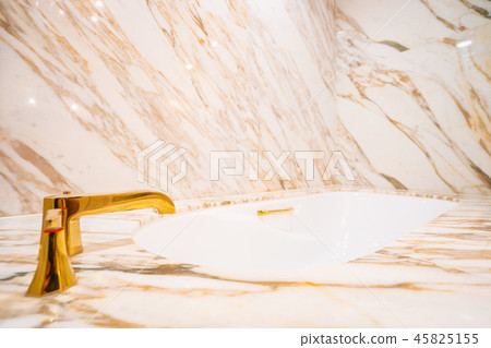 Beautiful luxury white bathtub and faucet 45825155