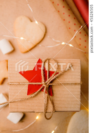 Christmas background with hand crafted gift 45826505