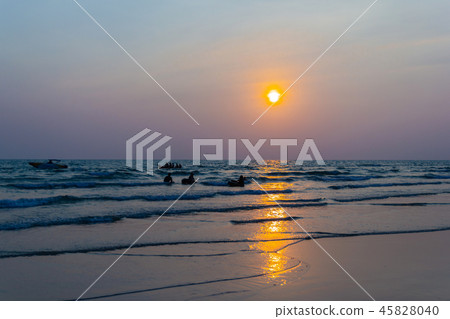 the beach during sunset and Silhouette 45828040