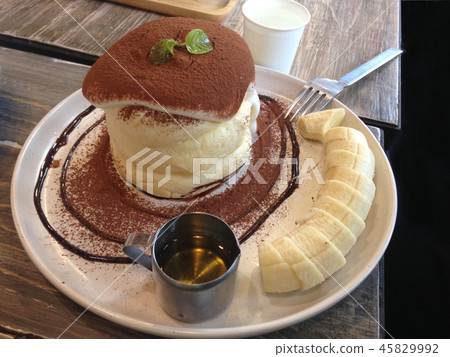 fluffy pancake with chocolate powder fluffy pancake with chocolate powder 45829992